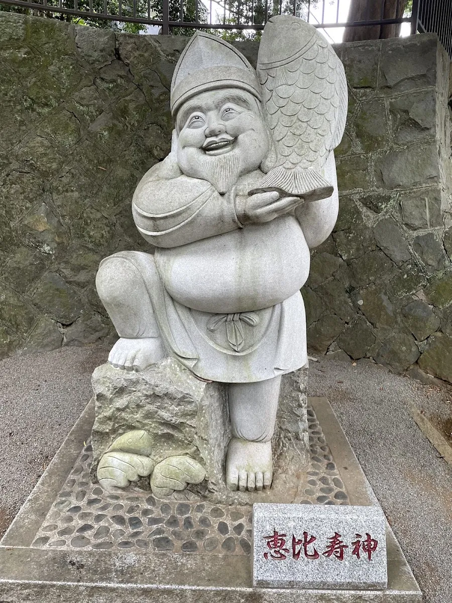 A stone statue of Ebisu, one of the Seven Lucky Gods
