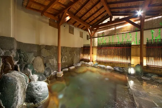Rock-lined open-air bath