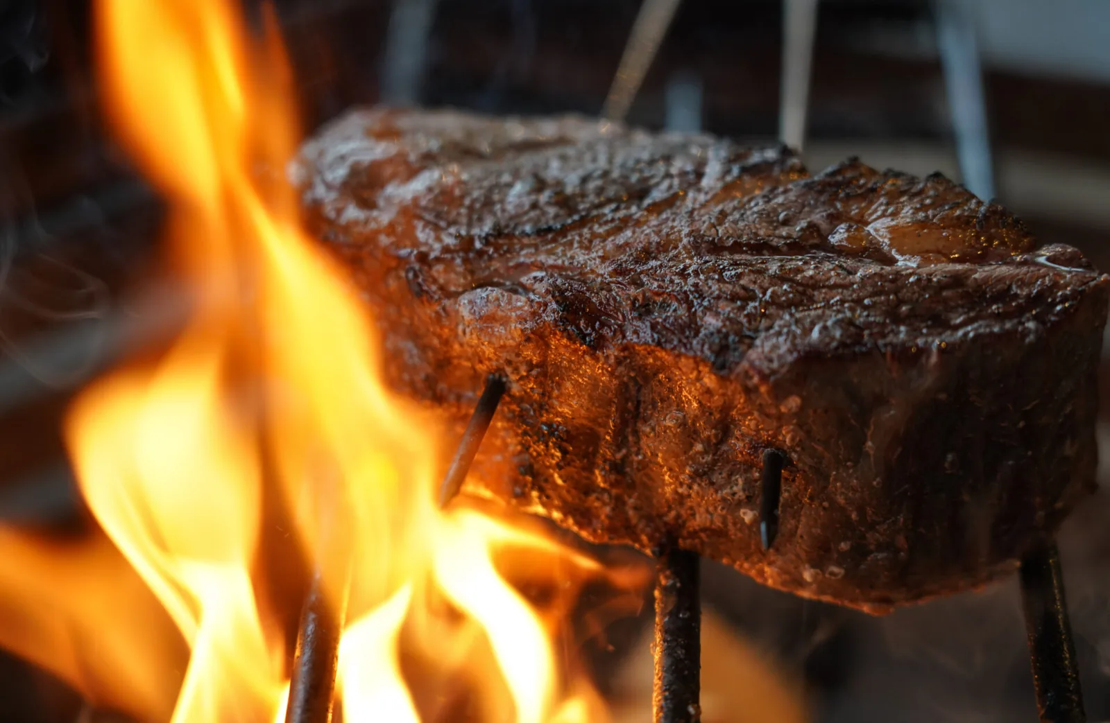 Meat grilling over an open fire